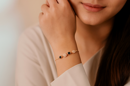 Elegant Gold-Plated Bracelet with Black & White Floral Stones