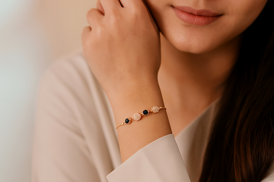 Elegant Gold-Plated Bracelet with Black & White Floral Stones