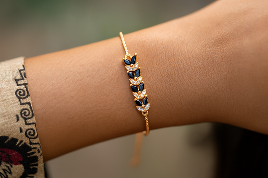 Stylish Gold-Plated Bracelet with Black Leaf & Crystal Detailing