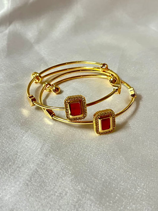Gold-Plated Bangles with Red Square Stone Charm