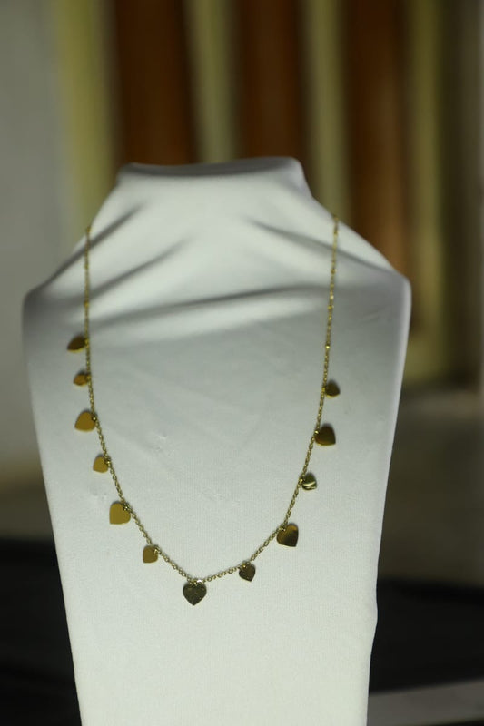 Delicate Gold Necklace with Multiple Heart Charms