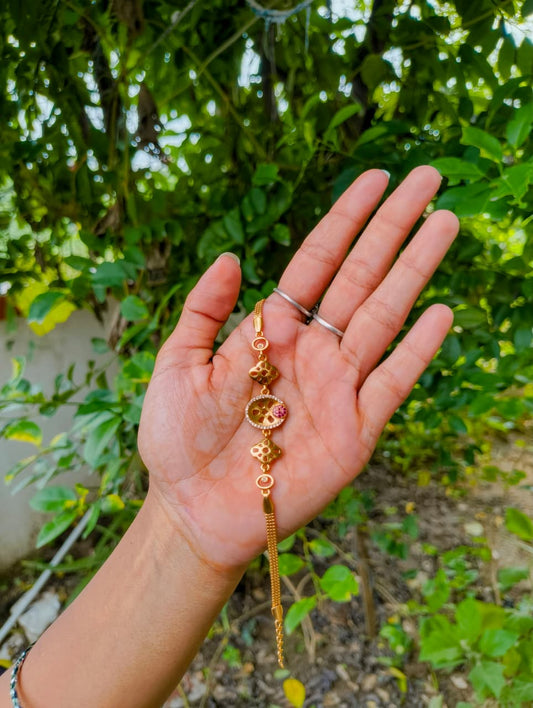Gold Bracelet with Red Stone Accent